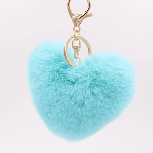 Close-up of light blue heart-shaped plush keychain with gold metal ring and chain