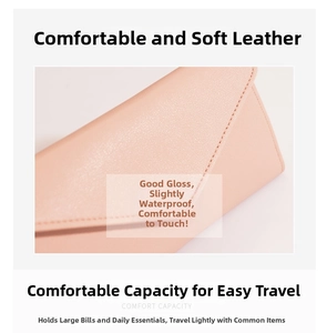 Close-up of pink long wallet texture showing soft grainy leather and flap stitching