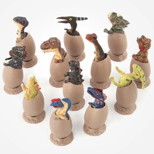 12-piece Jurassic dinosaur egg figurine set with realistic hatching models and bases