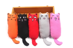 Close-up of durable cotton catnip toys in five colors with detailed facial embroidery