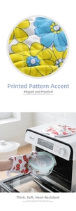 Detail of high-quality heat-resistant cotton kitchen glove with floral printing pattern