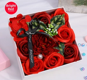 Detail of red soap flower gift box with Just for you ribbon and woven texture