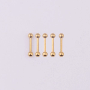 Set of 5 golden 316L stainless steel stud piercings with ball ends on purple background
