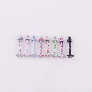Set of 8 colorful stainless steel labret studs with unique splatter texture finish