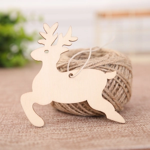 Detailed view of reindeer wooden Christmas hanging tag with rustic hemp rope on fabric