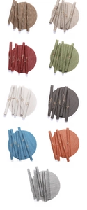 Detail of round PVC table mats in various colors showing bamboo weave texture and durability