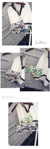 Close-up of comic graffiti style chain bag with LOVE prints in purple and green colors