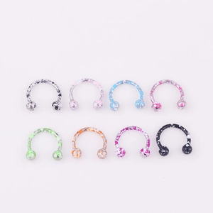 Set of 8 stainless steel horseshoe septum rings with colorful speckled splatter patterns