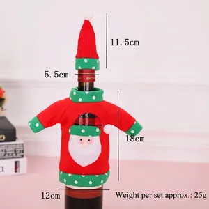 Detail of knitted Christmas wine bottle cover with Santa applique and mini hat decorations