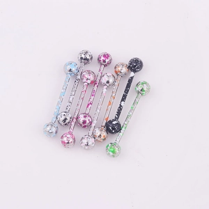 Set of seven colorful speckled barbell tongue rings made of stainless steel on white back