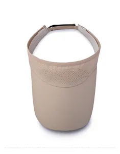 Macro view of khaki breathable mesh sun visor with embroidered sports logo on the brim