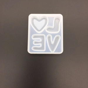 Top view of a square silicone LOVE letters mold for DIY crystal epoxy resin jewelry craft