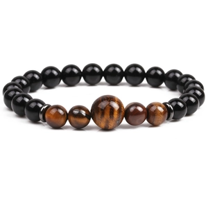 Handmade 8mm black onyx and tiger eye beaded bracelet with decorative metal spacers