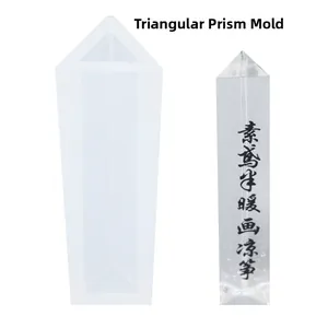 Macro view of triangular prism silicone mold and clear crystal resin pillar detail