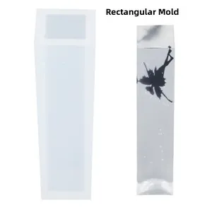 Rectangular strip silicone mold for DIY resin crafts showing a finished fairy pendant