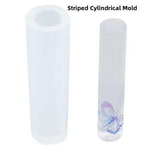 Detailed view of striped cylindrical silicone mold with resin butterfly pendant example