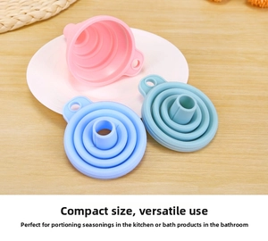 Detailed view of colorful collapsible silicone funnels for kitchen liquid pouring