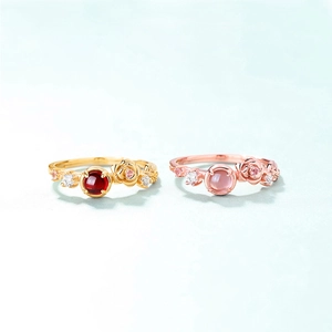 925 sterling silver rings with round garnets and floral rose design in gold and rose gold