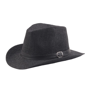 Detail of the black straw sun hat showing woven texture and black leather belt with buckle