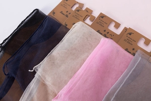 Detailed display of five sheer nylon crew socks in black navy beige pink and grey colors