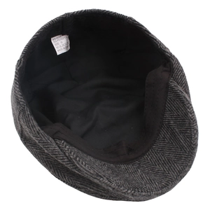 Grey herringbone newsboy cap made of 30% wool blend with inner lining and size 58 label