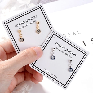 Evil Eye stud earrings with sparkling crystals in gold and silver finish options