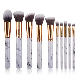 10-piece white marble makeup brush set with gold ferrules and gradient bristles