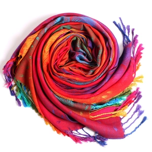 Detailed view of colorful jacquard ethnic scarf with soft texture and fringed edges