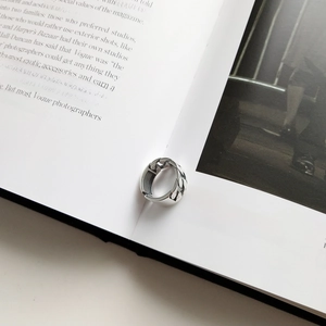 Detailed close-up of 925 sterling silver ring with vintage curb link chain design