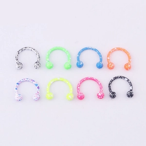 Eight-piece set of colorful splatter painted stainless steel horseshoe nose rings