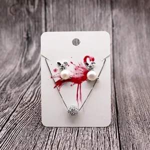 Rabbit pearl earrings and sparkling crystal ball necklace set on creative jewelry card