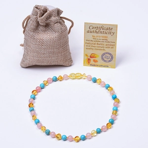 Collier pour bébé en ambre de la Baltique et quartz rose avec certificat et sachet