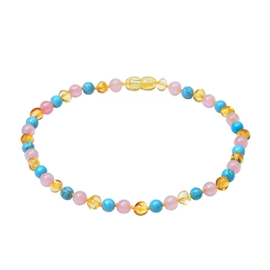 Collier pour bébé en ambre naturel et quartz rose avec des perles multicolores douces