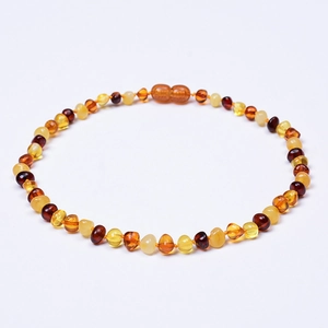Detailed shot of Baltic amber necklace featuring irregular beads with a secure screw clasp