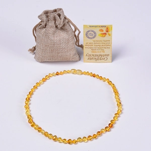 Polished Baltic amber necklace beads with certificates and a rustic linen drawstring bag