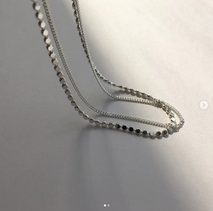 Close-up of S925 sterling silver double-layer anklet with flat beads and chains