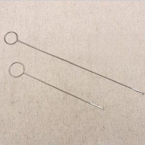 Macro shot of stainless steel loop turner hooks with latch ends for sewing and fabric tube turning