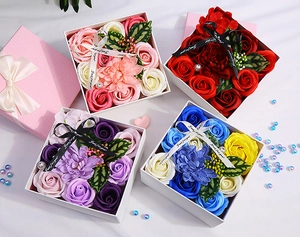 Detail of colorful soap flower gift boxes with roses, carnations and elegant ribbons