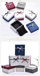 Detail of luxury textured paper gift boxes with bow ribbons and sponge padding