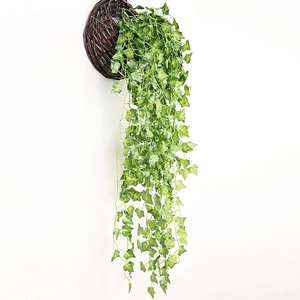 Lush green artificial ivy vine hanging from basket for wall decoration and home interior