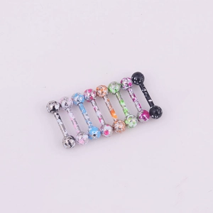 Set of stainless steel body piercing studs with various colorful splatter pattern beads