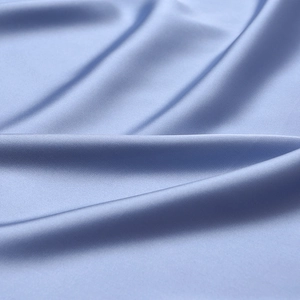 Elegant solid light blue silk square scarf with soft glossy finish and smooth texture