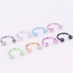 8-piece set of colorful horseshoe septum rings with polka dot paint in various colors