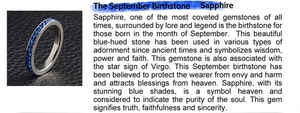Detailed view of September birthstone sapphire ring featuring blue stones in silver setting