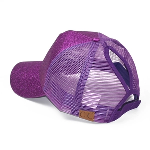 Detail view of purple sequin ponytail baseball cap with breathable mesh and elastic opening