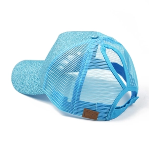 Detail of sky blue glitter ponytail baseball cap with breathable mesh and C.C leather tag