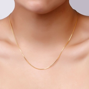 Elegant 14K gold plated box chain necklace displayed on a model for a refined look