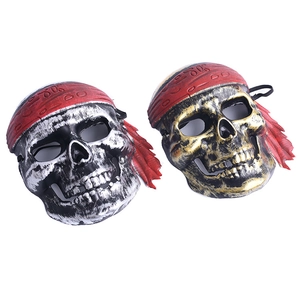 Halloween pirate skull masks in gold and silver colors with red embossed headscarves