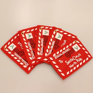 Red felt Christmas envelope ornaments with Santa Claus North Pole embroidery and gold hanging loop