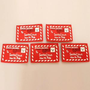 Five red felt Christmas envelope tags with gold strings for tree decoration and gift cards